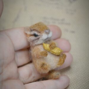 Needle felted chipmunk miniature with peanut. Handmade wool woodland animal with movable head and bendable legs. Perfect for collectors.