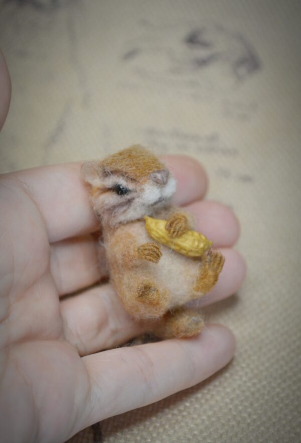 Needle felted chipmunk miniature with peanut. Handmade wool woodland animal with movable head and bendable legs. Perfect for collectors.
