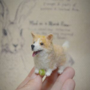 Adorable handmade corgi dog miniature felted from wool. A collectible for dog lovers, dollhouse displays, or anyone who enjoys unique handmade art.