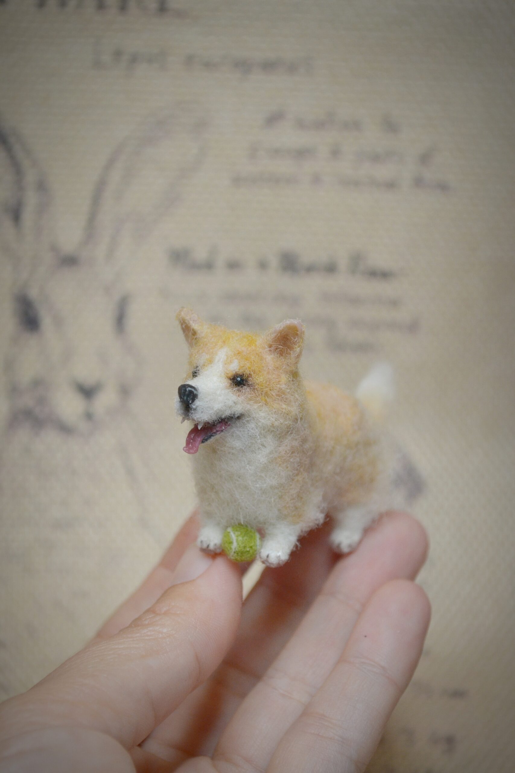 Adorable handmade corgi dog miniature felted from wool. A collectible for dog lovers, dollhouse displays, or anyone who enjoys unique handmade art.