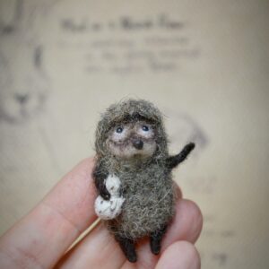 Handmade needle felted hedgehog inspired by Hedgehog in the Fog. Soft wool miniature with expressive details and a gentle storybook charm.