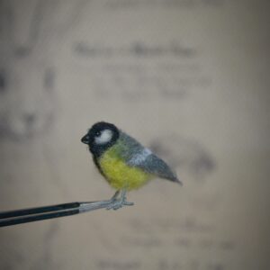Handmade needle felted tit miniature crafted from natural wool. A charming collectible inspired by the Great Tit songbird.
